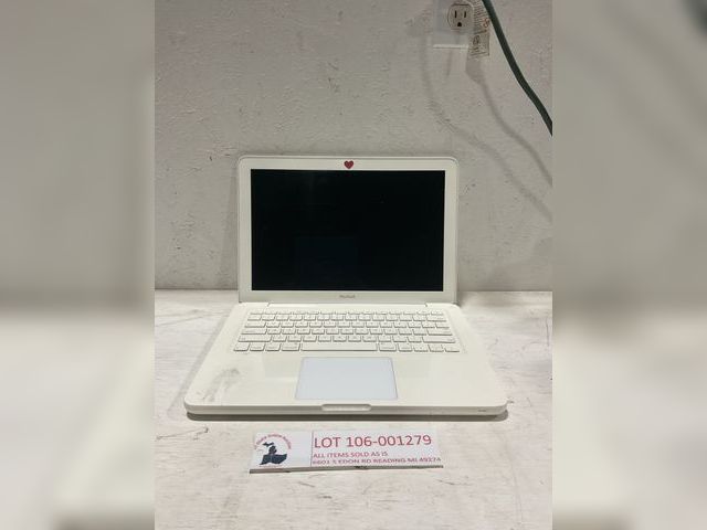 Lot 106-001279 - One 2009 Mac Book laptop. Turns on and is usable. Does come with a charger