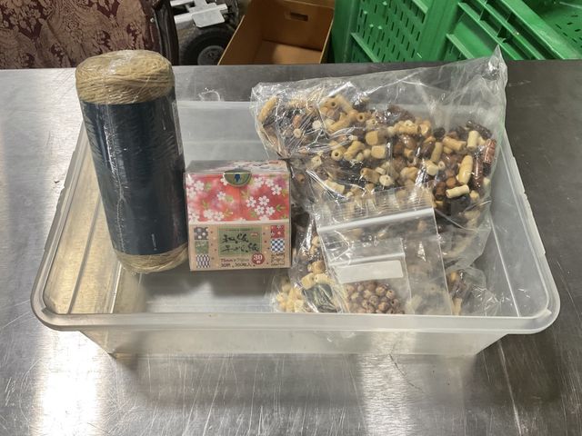 Lot 106-001219 - Box of misc craft items. One brand new role of twine. One small bag of beads. One large opened bag o...