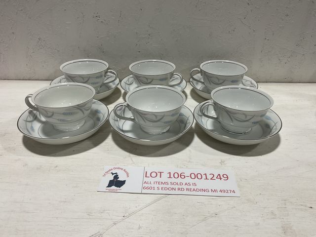 Lot 106-001249 - Set of 6 matching Valmont China tea cups and tea plates. Blue and gray feather design called royal w...
