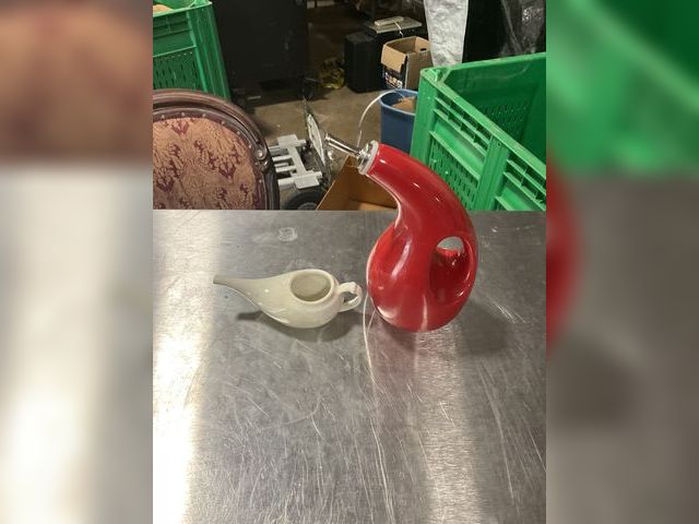 Lot 106-001221 - One olive oil pourer, one small pourer. Minor wear. Red one is Rachel ray. White one is stamped but ...