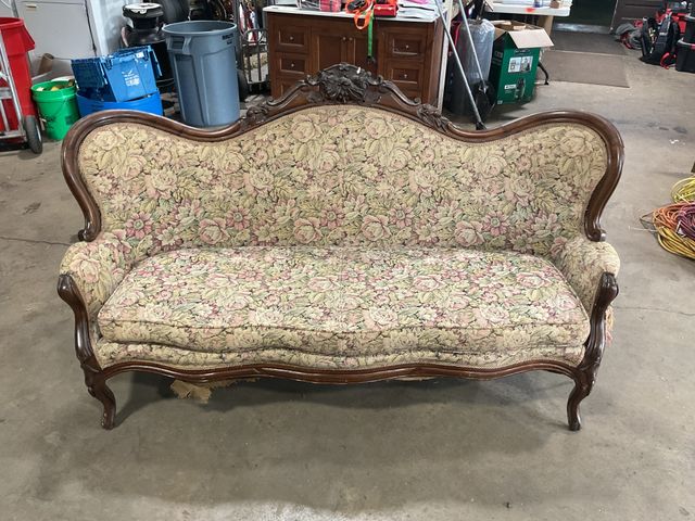 Lot 106-001188 - Vintage floral pattern couch. Needs refinished. Fabric is ripping. Bottom side fabric is drooping. S...