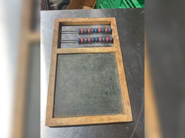 Lot 106-001230 - Vintage counter and chalk board. Needs cleaning. Red and blue beads. Wood