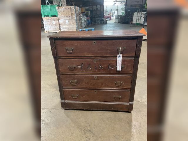 Lot 106-001244 - Wood dresser. Used condition