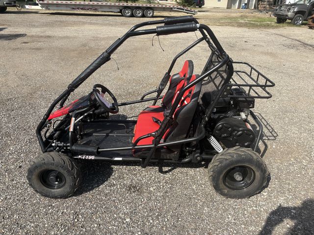 Lot 106-001288 - Coleman KT196 gas golf cart. Runs and operates. One seater. Pull start