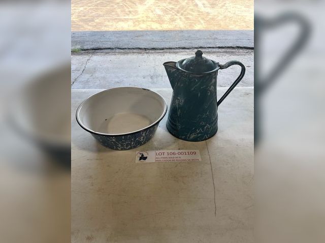 Lot 106-001109 - One blue and white marble bowl. Looks to be a dog bowl. Various chips and paint wear. One large blue...