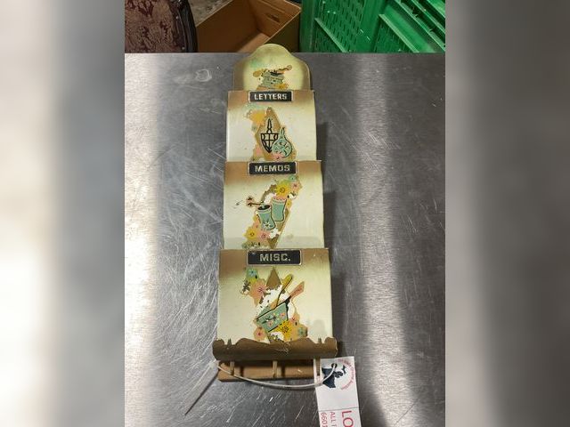 Lot 106-001211 - Three tier metal wall mount holder