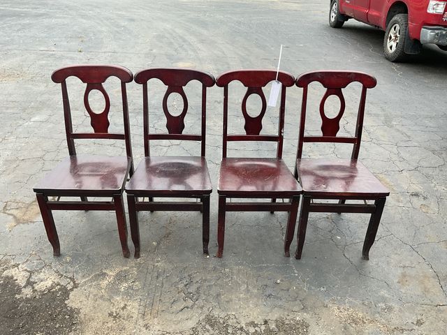 Lot 106-001206 - Set of 4 matching wood folding chairs.