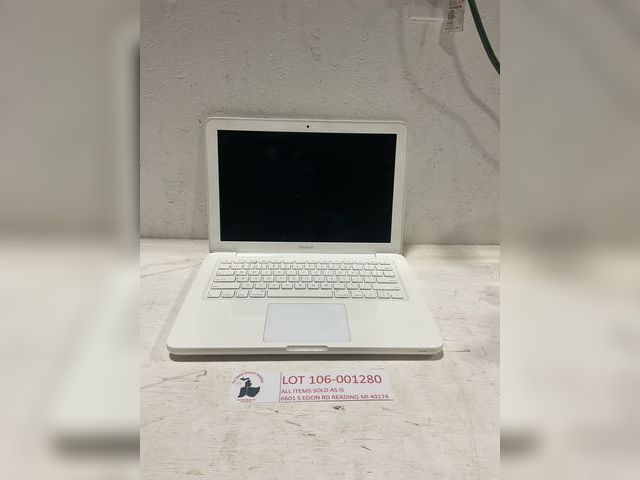 Lot 106-001280 - 2009 White Mac book laptop. Turns on and usable. Comes with charger. Some scuffs and scrapes