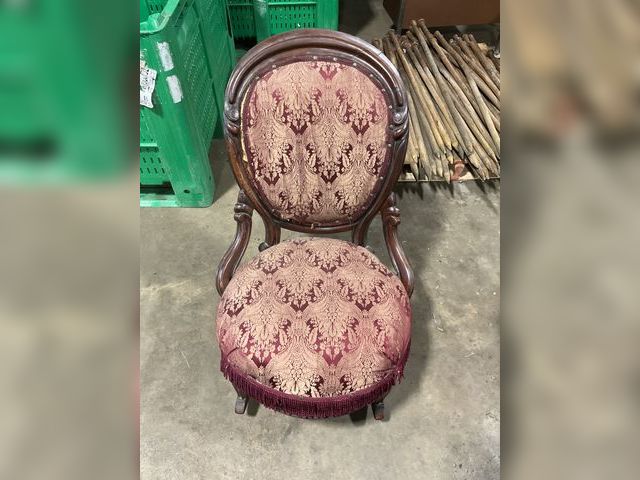 Lot 106-001203 - Vintage rocking chair. Red and gold in color. Dark wood. Needs repair on fabric