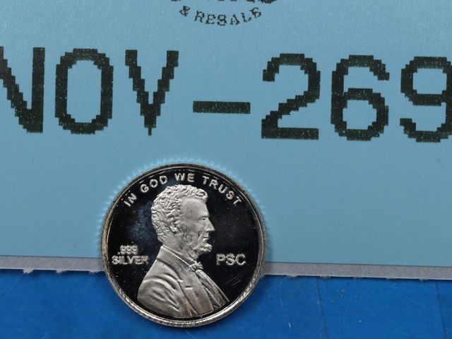 Lot 108-269 - 1 GRAM 999 SILVER LINCOLN SHIELD CENT DESIGN BULLION ROUND