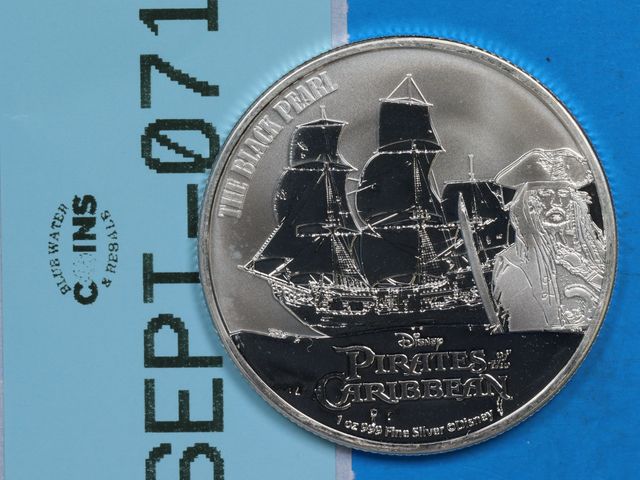 Lot 108-071 - 1oz SILVER PIRATES OF THE CARIBBEAN ONE OUNCE FINE SILVER 9999 DISNEY SILVER THE BLACK PEARL