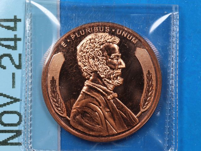 Lot 108-244 - 1oz 999 COPPER BULLION ROUND LINCOLN WHEAT BACK DESIGN