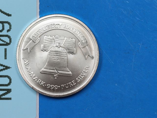 Lot 108-097 - 1oz 999 SILVER ROUND A-MARK LIBERTY BELL BULLION ROUND