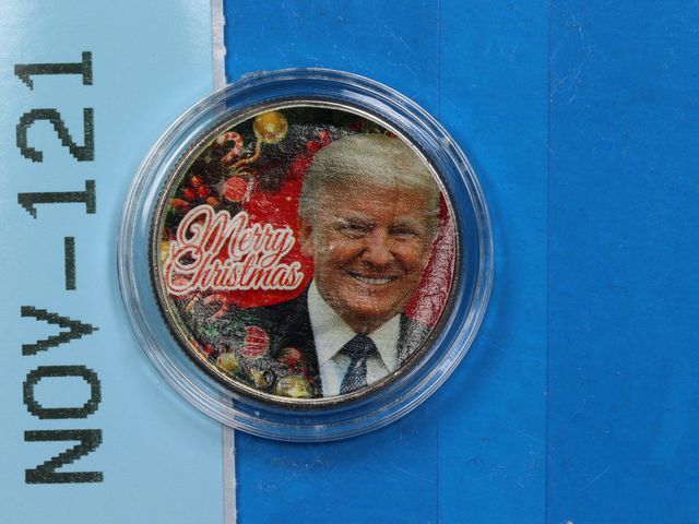 Lot 108-121 - COLORIZED DONALD TRUMP MERRY CHRISTMAS HALF DOLLAR WITH STAND