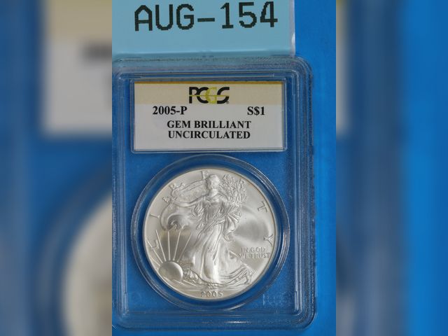 Lot 108-154 - 2005-P $1 SILVER AMERICAN EAGLE PCGS GEM BRILLIANT UNCIRCULATED FINE SILVER ONE OUNCE SILVER IN SLAB
