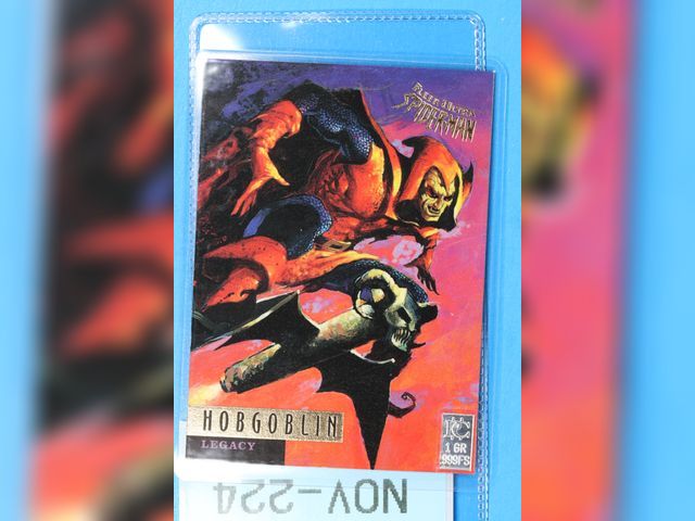 Lot 108-224 - 1 GRAIN 999 SILVER BAR ATTACHED TO A FLEER ULTRA SPIDERMAN CARD