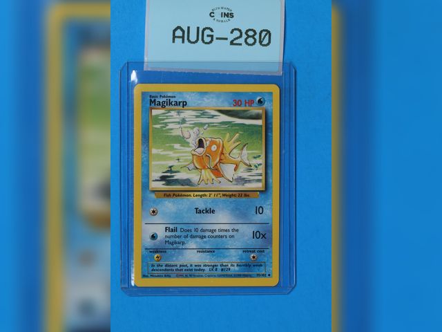 Lot 108-280 - 35/102 MAGIKARP 1999 POKEMON BASE SET NON HOLO PACK FRESH