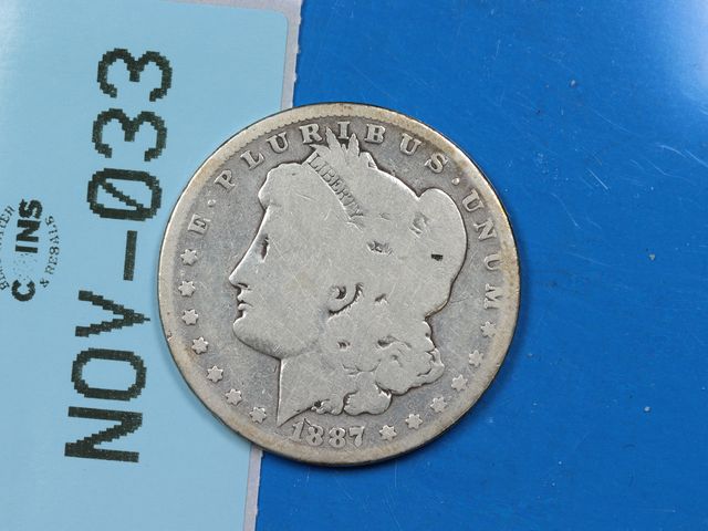 Lot 108-033 - 1887-O $1 MORGAN SILVER DOLLAR EARLY US TYPE COIN
