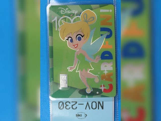 Lot 108-230 - 1 GRAIN 999 SILVER BAR ATTACHED TO A DISNEY 100 TINKER BELL CARD