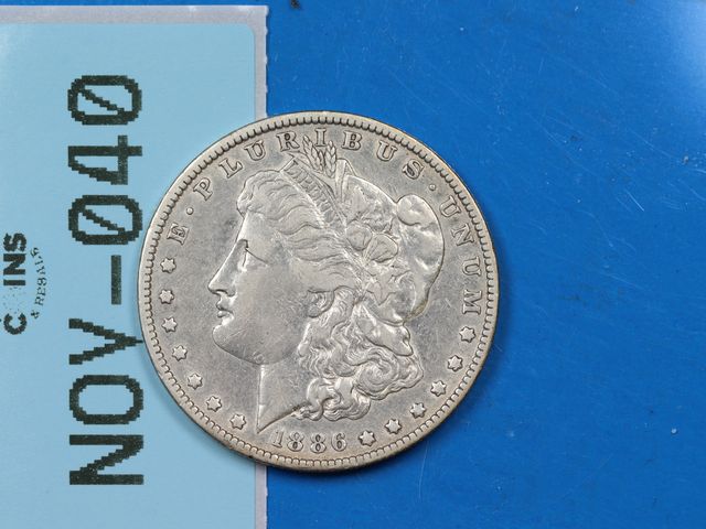 Lot 108-040 - 1886-O $1 MORGAN SILVER DOLLAR EARLY US TYPE COIN
