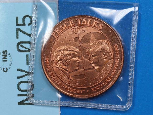 Lot 108-075 - 1oz 999 COPPER ROUND 2018 DATED PEACE TALKS BULLION ROUND