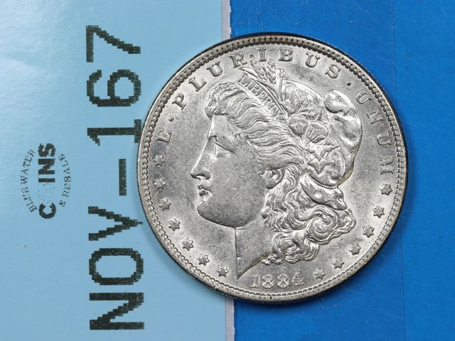 Lot 108-167 - 1884 $1 MORGAN SILVER DOLLAR HIGHER GRADE EXAMPLE EARLY US TYPE COIN