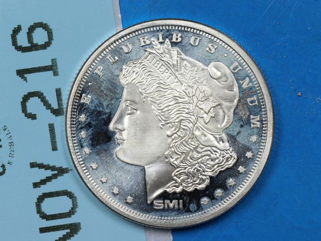 Lot 108-216 - 1OZ 999 SILVER BULLION ROUND SMI MORGAN HEAD DESIGN