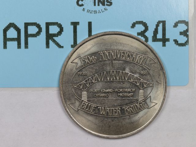 Lot 108-343 - 1988 BLUE WATER BRIDGE TOKEN 50TH ANNIVERSARY COMMEMORATIVE TOKEN CANADA TOLL TOKEN PORT HURON MICHI...