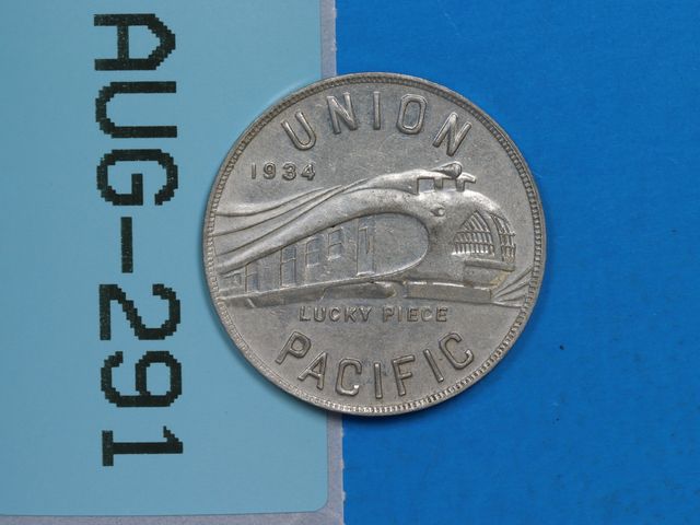 Lot 108-291 - 1934 UNION PACIFIC LUCKY PIECE ALUMINUM CO. OF AMERICA RAILROAD TRAIN TOKEN COIN
