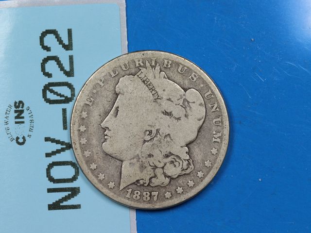Lot 108-022 - 1887 $1 MORGAN SILVER DOLLAR EARLY US TYPE COIN