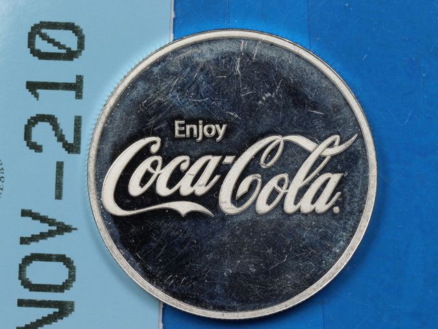 Lot 108-210 - 1OZ 999 SILVER BULLION ROUND COCA COLA COKE DESIGN