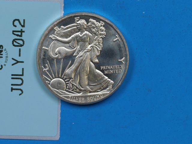 Lot 108-042 - 2oz FINE SILVER WALKING LIBERTY SILVER BULLION ROUND