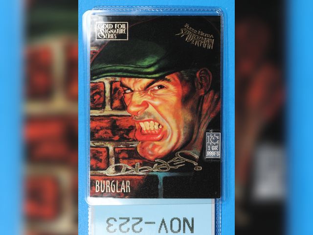 Lot 108-223 - 1 GRAIN 999 SILVER BAR ATTACHED TO A FLEER ULTRA SPIDERMAN CARD