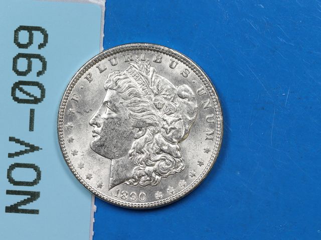 Lot 108-099 - 1890 $1 MORGAN SILVER DOLLAR NICE HIGHER GRADE EXAMPLE