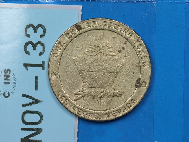 Lot 108-133 - STRATOSPHERE ONE DOLLAR GAMING TOKEN LAS VEGAS CASINO SLOT MACHINE