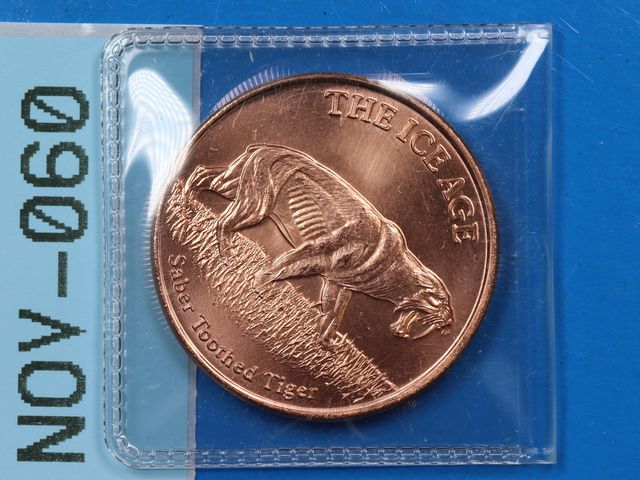 Lot 108-060 - 1oz 999 COPPER ROUND THE ICE AGE SABER TOOTHED TIGER DESIGN BULLION