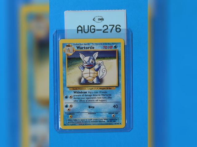 Lot 108-276 - 42/102 WARTORTLE 1999 POKEMON BASE SET NON HOLO PACK FRESH