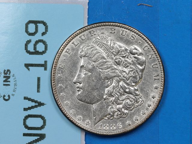 Lot 108-169 - 1886 $1 MORGAN SILVER DOLLAR EARLY US TYPE COIN
