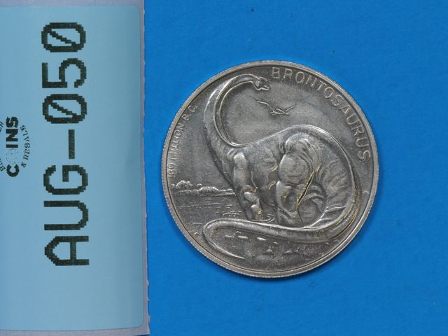 Lot 108-050 - VINTAGE POST CEREAL DINOSAUR FAMILY TREE TOKEN BRONTOSAURUS