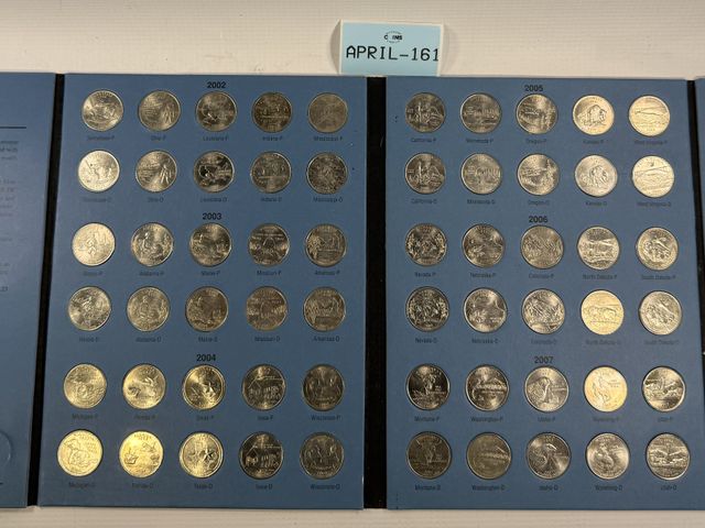 Lot 108-161 - 1999-2008 DELUXE EDITION FIFTY STATE COMMEMORATIVE QUARTER FOLDER WITH COINS COMPLETE