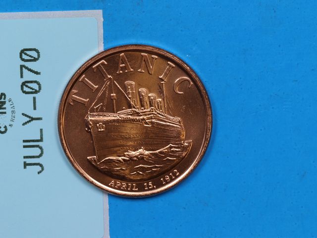 Lot 108-070 - 1oz COPPER TITANIC SHIP BOAT APRIL 15 1912 USA EAGLE ROUND