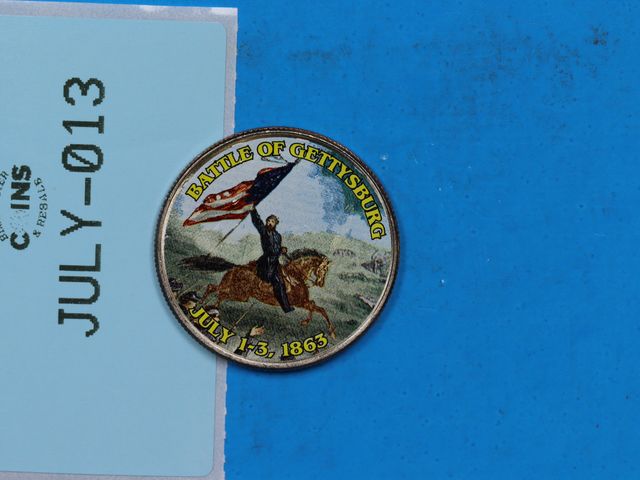 Lot 108-013 - COLORIZED BATTLE OF GETTYSBURG JULY 1-3, 1863, OVER CLAD KENNEDY HALF DOLLAR