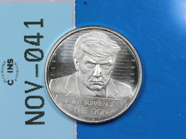 Lot 108-041 - 1oz 999 SILVER TRUMP MUG SHOT SILVER BULLION ROUND
