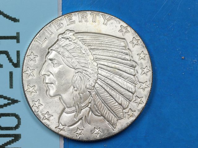 Lot 108-217 - 1OZ 999 SILVER BULLION ROUND INCUSED INDIAN DESIGN