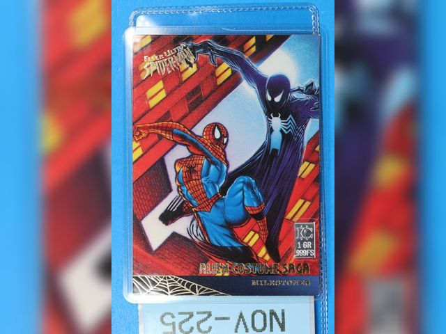 Lot 108-225 - 1 GRAIN 999 SILVER BAR ATTACHED TO A FLEER ULTRA SPIDERMAN CARD