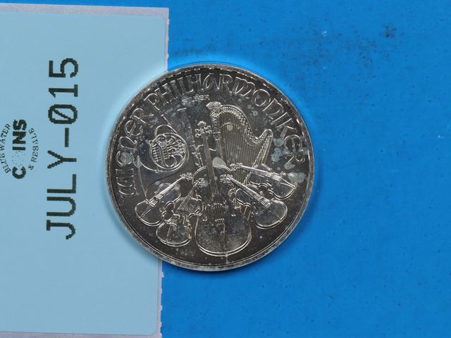 Lot 108-015 - 2021 1oz FINE SILVER PHILHARMONIC AUSTRIAN BULLION COIN MILK SPOTTING