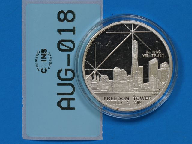 Lot 108-018 - 2004 SILVER CLAD FRREDOM TOWER COIN ONE DOLLAR MARIANA ISLANDS COIN WE WILL NEVER FORGET