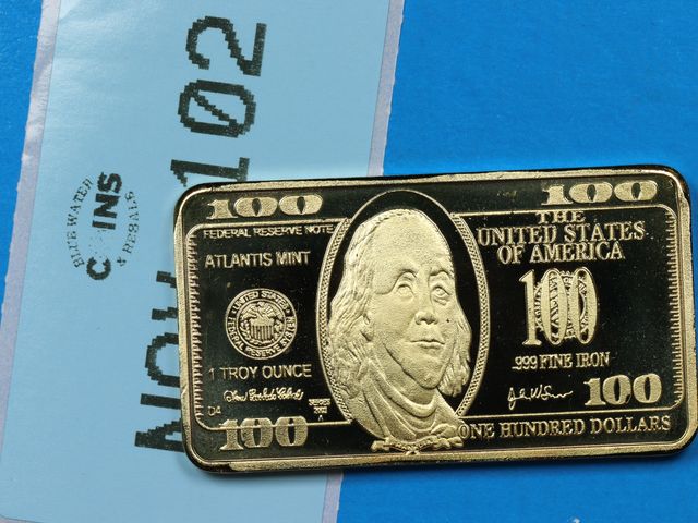 Lot 108-102 - 1oz 999 PURE IRON $100 FRANKLIN BILL DESIGN