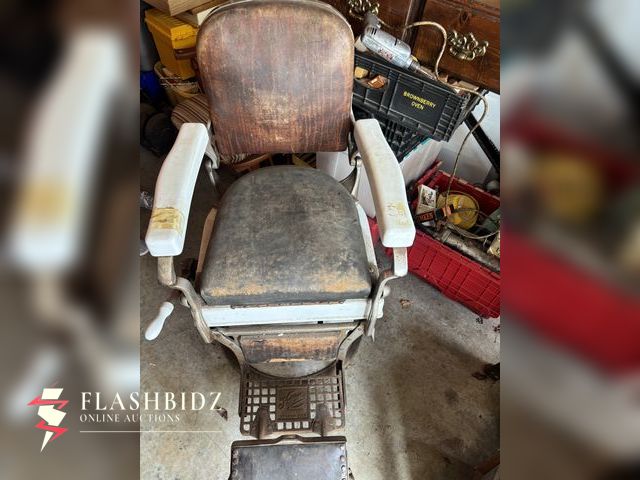 Lot 109-22-123 - Step back in time with this authentic vintage Koken barber chair from St. Louis, Missouri. Featuring...