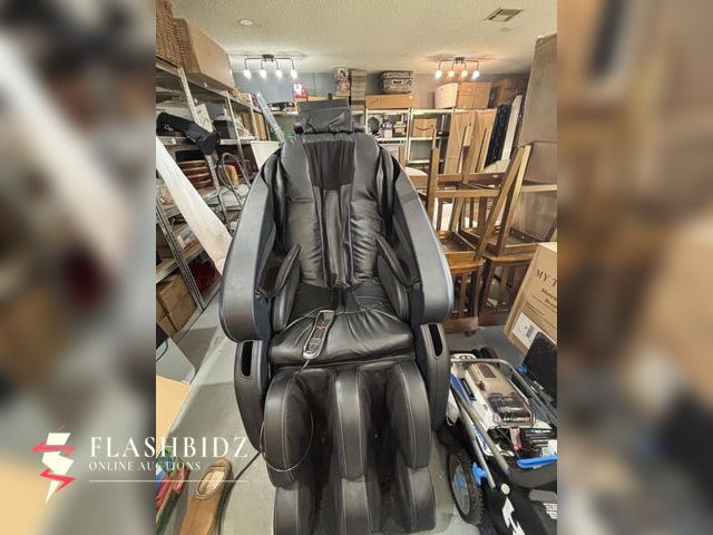 Lot 109-41 - Brookstone Full Body Massage Chair – Black Leather Recliner with Remote